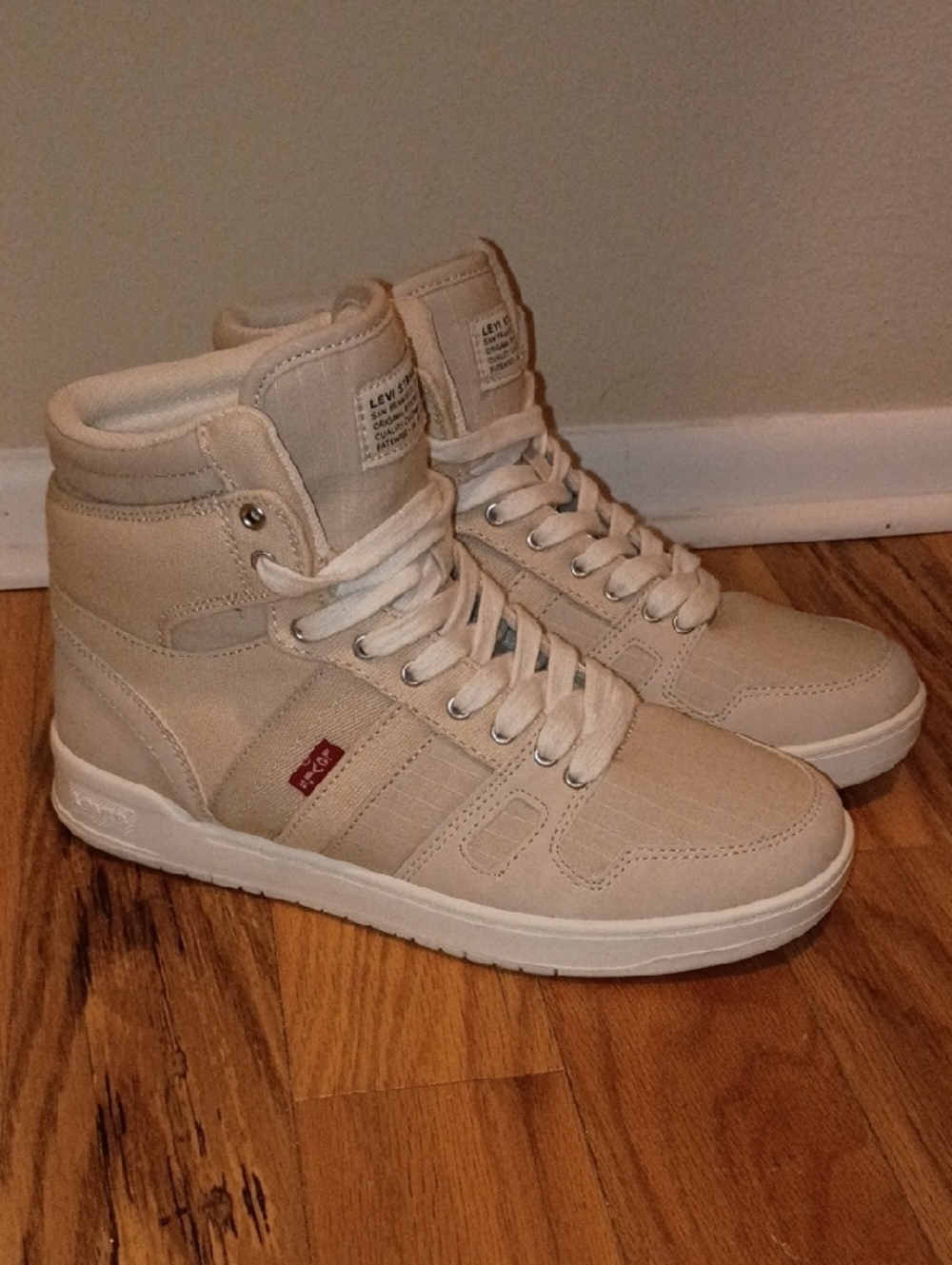 Women's Levi's Cream High-Top Sneakers with Subtle Red Tag | Size 7.5